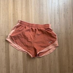 Nike terracotta colored running shorts size medium